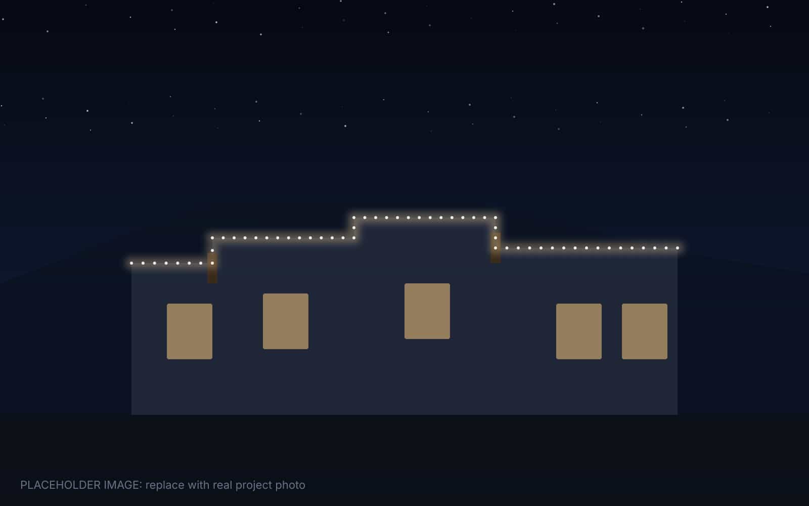 Pueblo Revival stucco home in Albuquerque with permanent LED lighting along the parapet at night